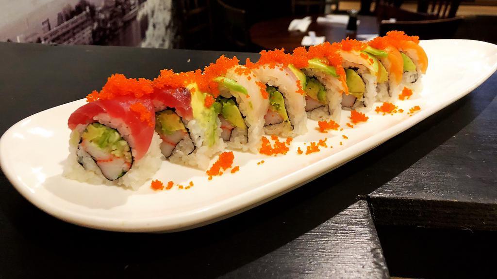 Rainbow Roll · Cucumber, avocado and crab inside, topped with assorted fish.