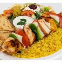 Chicken Kabob Plate · A large portion of grilled marinated chicken breast, tomatoes, onions, and bell peppers serv...