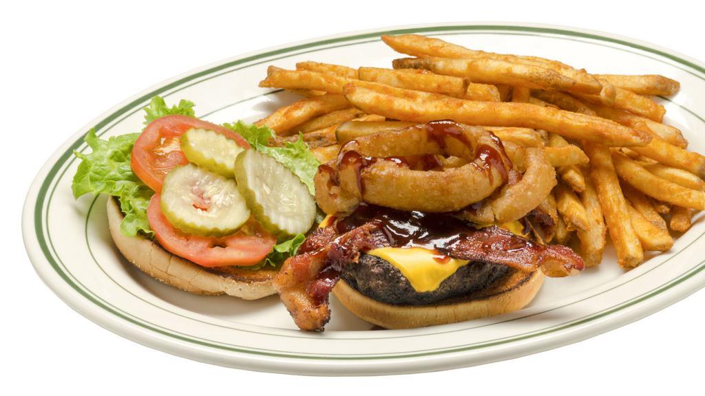 Western Bbq Burger · 1/2 Lb. Burger with our homemade bbq sauce, american cheese, onion rings, Two strips of bacon, lettuce, tomatoes and pickles on a grilled bun.