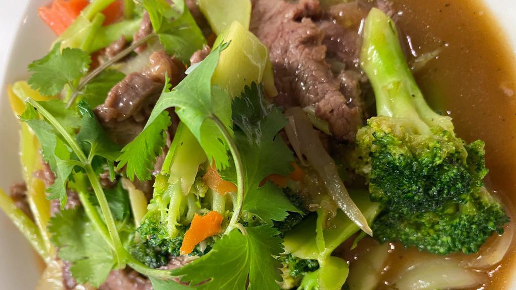 Stir-Fried Beef With Broccoli & Celery · Served with steamed rice.