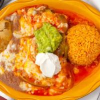 Enchiladas Rancheras · Two cheese enchiladas covered with our special ranchera sauce. Served with rice, beans, guac...