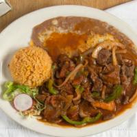 Bistequitos Rancheros · Tender USDA choice top sirloin strips and vegetables covered with our special ranchera sauce...