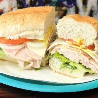 Turkey Breast Sandwich · Lettuce, tomato, onions, mustard, mayo, Italian dressing and provolone cheese. Made on a Fre...