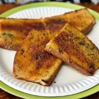 Garlic Bread · Two thin slices (6