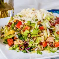 Italian Chopped Salad · Mixed baby greens with tomatoes, mushrooms, red onions, pepperoncinis, basil, italian salami...