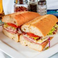 Etna'S Classic Torpedo Sandwich · Prepared on a toasted italian roll with imported mortadella pistachio, italian and cotto sal...