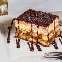 Tiramisu · Imported from italy. Soft sponge base soaked with vanilla and espresso coffee. Layered with ...