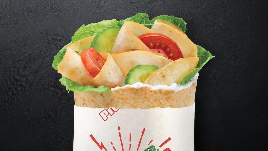 Kids Turkey · The kids turkey pita comes with grilled turkey and your choice of three toppings, one cheese and one sauce all wrapped in a small pita shell.