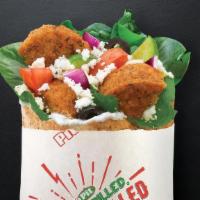 Kids Falafel · The kids falafel pita comes with grilled falafel and your choice of three toppings, one chee...