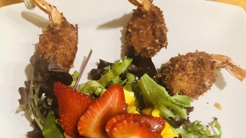 Coconut Shrimp · 8 Pc. Butterfly Shrimp Breaded in Panko and Coconut / Drizzled with Sweet Coconut Sauce / Served with Tropical Fruit and Spring Mix Salad with Asian Sesame Dressing