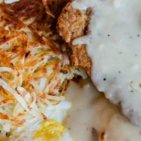 Chicken Fried Steak And Eggs · Smothered with country gravy and served with 2 eggs any style. Served with your choice of po...