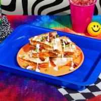 Clocked Out Chicken Quesadilla · Crisp flour tortilla and melted cheese with fried chicken bites, bacon bits, scallions, and ...