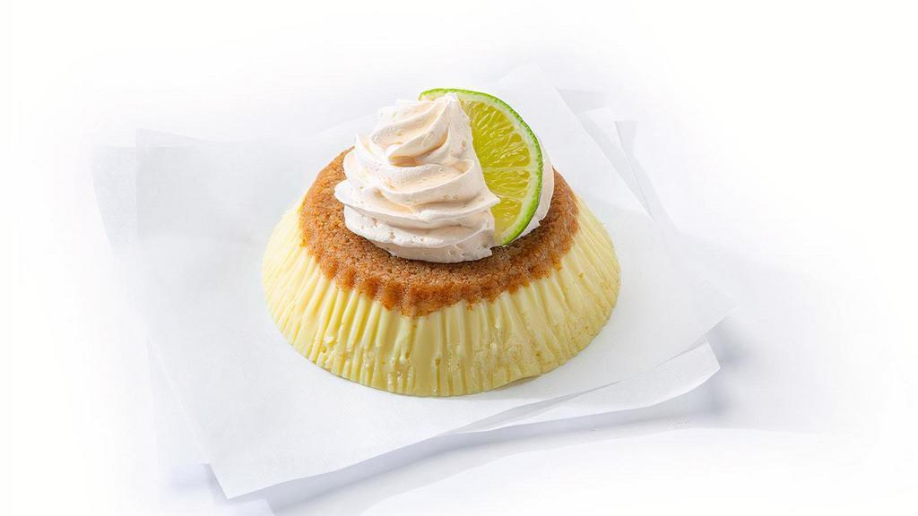 Key Lime Pie · Made with freshly squeezed lime juice and house-made custard and graham cracker crust. Served with whole-milk whip cream and a lime wedge.