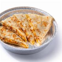 A La Carte Quesadillas · Filled with meat and cheese. Is NOT served with cilantro lime rice or beans.