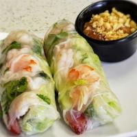 Spring Rolls · Wrapped with lettuce, vermicelli noodles in rice paper and served with peanut sauce.