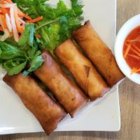 Egg Rolls · 4 Egg rolls filled with mixed ground pork, taro, carrots, onions, and mushrooms. Served with...