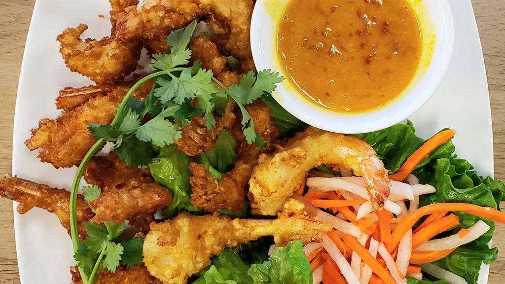 Butterfly Crispy Shrimp · Eight pieces of shrimp dipped in batter and fried to a crisp. Served with a blend of sweet and sour sauce.