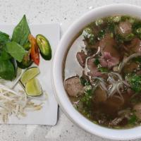 I Love Pho · Filet mignon meat, tendons, fat brisket, flank, tripe, and meatballs in a clear beef broth.