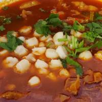 Menudo · Spicy Mexican soup with chucks of tripe in a chili-infused broth. Size large.