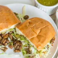 Carne Asada Torta · Chopped up steak guacamole lettuce and pico de gallo