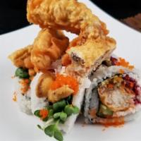 Spider Roll · In: Soft Shell Crab, Avocado, Cucumber, Crabmeat, Gobo. Out: Soft Shell Crab, Masago, Eel Sa...