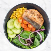 Pepper Salad With Salmon · Cucumbers, cherry tomatoes, onions, and corn over mixed greens.
