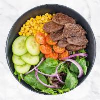 Pepper Salad With Angus Cut Steak · Cucumbers, cherry tomatoes, onions, and corn over mixed greens.