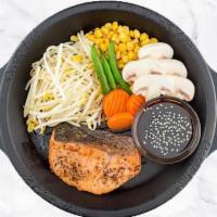 Teriyaki Salmon · Entree comes with veggies and a side of rice.