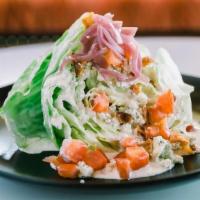 The Wedge · Iceberg Lettuce, Bacon, Tomatoes, Pickled Onions, House Bleu Cheese, Ranch