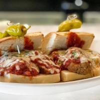 Meatball Sandwich · Hand-Rolled Meatballs, House Marinara Sauce, Fresh Mozzarella Cheese