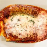 Cannelloni · Beef Stuffed Pasta, House Marinara Sauce, Melted Mozzarella. . Choice of (2) Meatballs or (1...