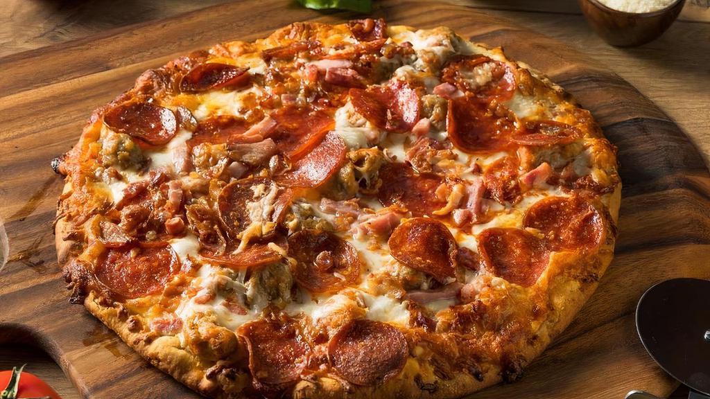 Individual Meat Lovers Pizza · Pepperoni, Sausage, Meatball, Salami, Canadian Bacon, Cheese.