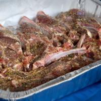 Lamb Chops (Uncooked) · Uncooked, seasoned and marinated lamb chops (32 pieces).