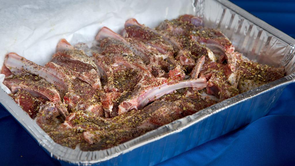 Lamb Chops (Uncooked) · Uncooked, seasoned and marinated lamb chops (32 pieces).