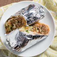Super Burrito · Includes any kind of meat, beans, rice, sour cream, guacamole, cheese, pico de gallo