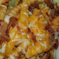 Charli’S Bacon Cheese Fries · Crinkle cut fries served with melted cheddar-jack cheese and bacon, served with ranch.