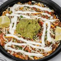 Burrito Bowl · Spanish rice, pinto beans, cheese, sour cream, guacamole, pico de gallo, choice of protein.