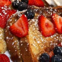 French Toast · Served with seasonal berries, whipped cream and maple syrup. Gluten-free bread available upo...