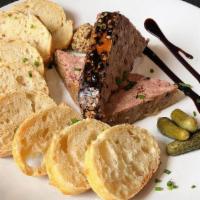 Housemade Paté · Served with sliced baguette. Gluten free bread available upon request.