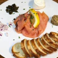 Le Salmon · Smoked Salmon, capers, onion, cream cheese, toast. Served with mixed greens. Gluten Free Bre...