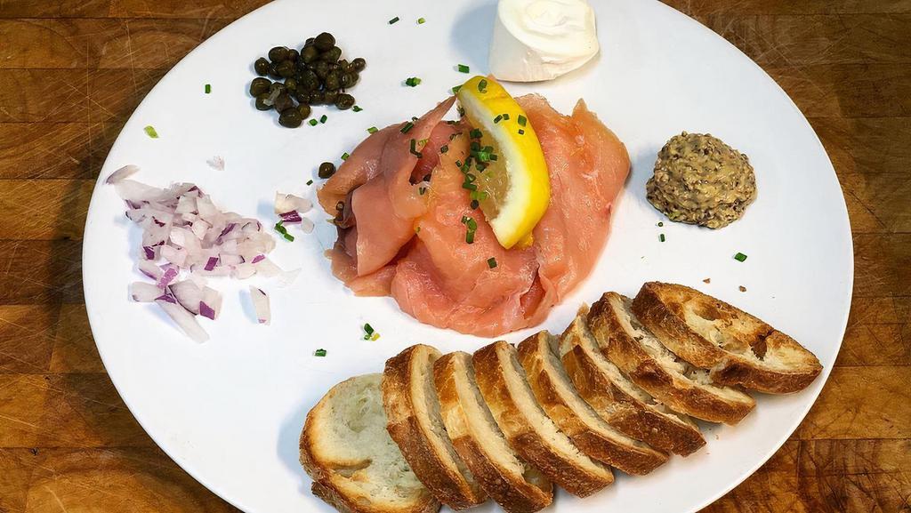 Le Salmon · Smoked Salmon, capers, onion, cream cheese, toast. Served with mixed greens. Gluten Free Bread available upon request.