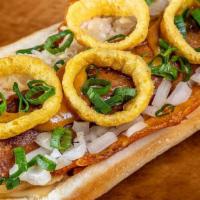 Beyond Dog · Plant based Beyond sausage, a cheddar cheese skirt, kraut, caramelized & green onion, pickle...