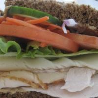 Surfer’S Choice Sandwich · Turkey & chicken, with your choice of bread, cheese, and spread. Assorted with Cream of the ...