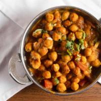 Channa Masala · Chick peas, onions, and tomatoes cooked in a light sauce.