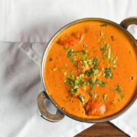 Chicken Tikka Masala · Boneless piece of chicken tikka cooked in creamy butter sauce with fresh tomatoes and fragra...