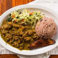Curried Goat · Goat meat seasoned with fresh spices and Jamaican curry and cooked to perfection with potato...