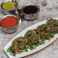 Kale Pakoda · Vegan, vegetarian, and gluten-free. Savory Kale fritter coated with curried and chickpeas ba...
