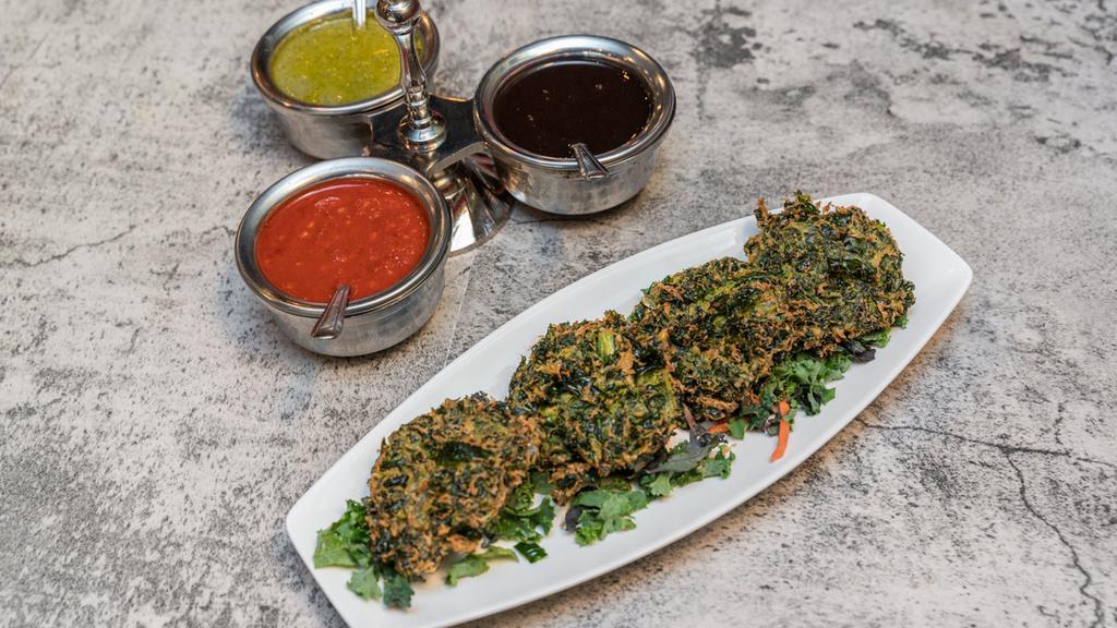 Kale Pakoda · Vegan, vegetarian, and gluten-free. Savory Kale fritter coated with curried and chickpeas batter.