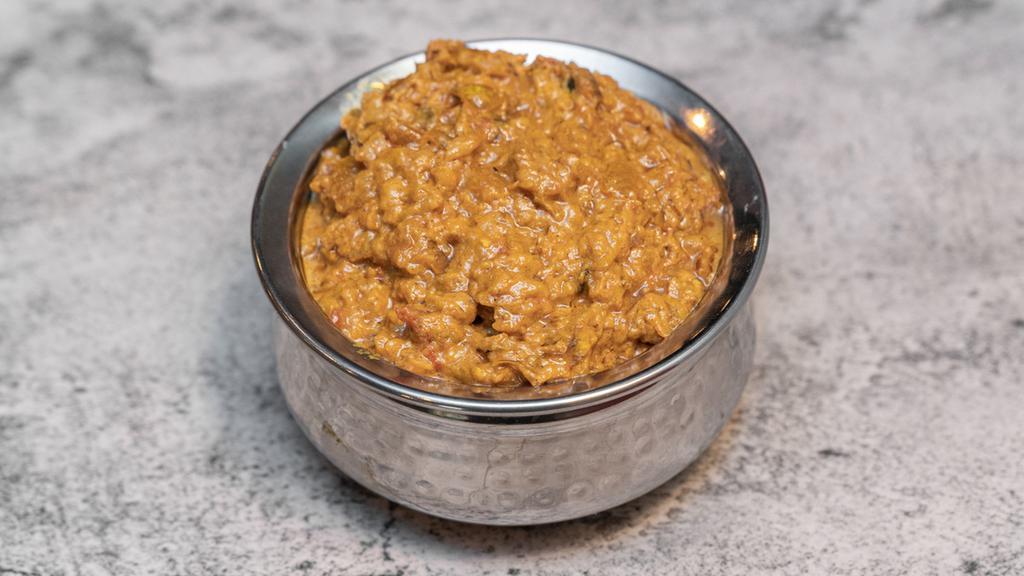 Egg Plant Bharta · Vegetarian and gluten-free. Tandoori Roasted Eggplant cooked with hand pound spices.