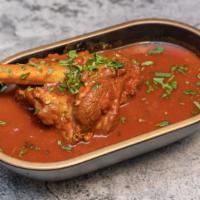 Lamb Shank Masala · Gluten-free.  Slow braised shank gently simmered in bone marrow stock with browned onion,  m...